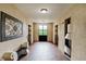 Lobby with elevators, water cooler, and ornate wall art at 12527 Floridays Resort Dr # E-103, Orlando, FL 32821