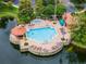 Resort-style pool with a gazebo and plenty of lounge chairs at 12527 Floridays Resort Dr # E-103, Orlando, FL 32821