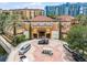 Aerial view of resort showing building, landscaping, and parking at 12527 Floridays Resort Dr # E-103, Orlando, FL 32821