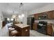 Modern kitchen with granite countertops and stainless steel appliances at 12527 Floridays Resort Dr # E-103, Orlando, FL 32821