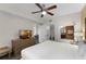 King bedroom with ensuite bathroom and a TV at 12527 Floridays Resort Dr # E-103, Orlando, FL 32821