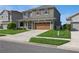 Two-story house with a two-car garage and landscaping at 1856 Castleton Dr, Saint Cloud, FL 34771