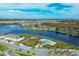 Aerial view of community with lake and houses at 15109 Willow Arbor Cir, Orlando, FL 32824