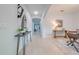 Bright entryway with contemporary decor and view to the living area at 5249 Villa Rosa Ave, St Cloud, FL 34771
