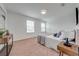 Bedroom with carpet, neutral decor, and two windows at 5249 Villa Rosa Ave, St Cloud, FL 34771