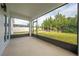 Screened porch with view of backyard at 5249 Villa Rosa Ave, St Cloud, FL 34771