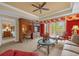 Spacious living room with access to a private balcony and plenty of natural light at 7650 Whisper Way # 203, Reunion, FL 34747