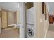 Convenient in-unit laundry with stackable washer and dryer at 7650 Whisper Way # 203, Reunion, FL 34747