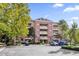 Three-story apartment building with parking and landscaping at 7650 Whisper Way # 203, Reunion, FL 34747