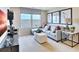 Spacious loft area with a comfortable sofa and built-in desk at 1751 Carnelian St, Deland, FL 32720