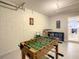 Garage game room featuring foosball and additional space at 270 Earlmont Pl, Davenport, FL 33896