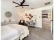 Bright bedroom with built-in workspace and en-suite bathroom at 270 Earlmont Pl, Davenport, FL 33896