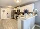 Modern kitchen with stainless steel appliances and white cabinets at 270 Earlmont Pl, Davenport, FL 33896