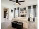 Spacious bedroom with a comfortable bed and en-suite bathroom at 270 Earlmont Pl, Davenport, FL 33896