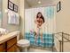 Charming bathroom with Moana-themed shower curtain and modern vanity at 270 Earlmont Pl, Davenport, FL 33896