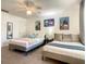 Spacious bedroom with twin beds and plenty of natural light at 270 Earlmont Pl, Davenport, FL 33896