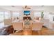 Bright living room featuring hardwood floors and a cozy seating area at 4121 Albritton Rd, St Cloud, FL 34772