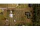 Aerial view of property showing home, outbuildings, and land at 4121 Albritton Rd, St Cloud, FL 34772