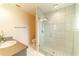Bathroom with a large glass shower and single vanity at 4121 Albritton Rd, St Cloud, FL 34772