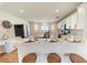 Modern kitchen with white cabinets, marble countertops, and an island at 4121 Albritton Rd, St Cloud, FL 34772
