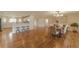 Spacious kitchen with white cabinets, marble countertops, and stainless steel appliances at 4121 Albritton Rd, St Cloud, FL 34772