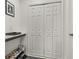 Bright entry closet with built-in shelving and rod at 4919 Conifer Cone Dr, Kissimmee, FL 34746