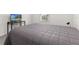 Bright bedroom featuring a comfortable bed and a TV at 4919 Conifer Cone Dr, Kissimmee, FL 34746