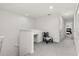 Upstairs hallway with seating and access to bedrooms at 4919 Conifer Cone Dr, Kissimmee, FL 34746