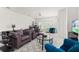 Bright living room with two sofas and a view of the backyard at 4919 Conifer Cone Dr, Kissimmee, FL 34746
