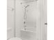Clean bathroom with a bathtub and shower at 4919 Conifer Cone Dr, Kissimmee, FL 34746