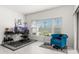 Home office with desk, chair, and plenty of natural light at 4919 Conifer Cone Dr, Kissimmee, FL 34746