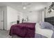 Main bedroom with large bed and ensuite bathroom at 4919 Conifer Cone Dr, Kissimmee, FL 34746