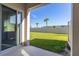 Private backyard with grassy area and fenced perimeter at 4919 Conifer Cone Dr, Kissimmee, FL 34746