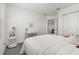 Bedroom with a large bed, closet, and small desk at 4919 Conifer Cone Dr, Kissimmee, FL 34746
