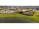 Community playground with shaded play area near lake at 4919 Conifer Cone Dr, Kissimmee, FL 34746