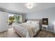 Main bedroom with sliding door to backyard pool at 632 Pinewood Dr, Davenport, FL 33896