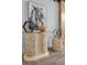 Stone console table with decorative accents at 632 Pinewood Dr, Davenport, FL 33896