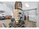 Modern kitchen with gray cabinets, marble island, and stainless steel appliances at 632 Pinewood Dr, Davenport, FL 33896