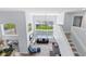 Open living area with high ceilings and a view of the pool at 632 Pinewood Dr, Davenport, FL 33896