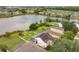 Aerial view of lakefront home with backyard at 632 Pinewood Dr, Davenport, FL 33896