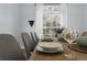 Table setting for eight with large windows at 632 Pinewood Dr, Davenport, FL 33896