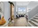 Bright living room with high ceilings and a view of the backyard at 632 Pinewood Dr, Davenport, FL 33896