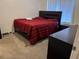 Spacious bedroom with king-size bed and ample floor space at 6364 Sedgeford Dr, Lakeland, FL 33811