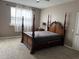 Main bedroom with large bed and plenty of space at 6364 Sedgeford Dr, Lakeland, FL 33811