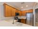 Modern kitchen with stainless steel appliances and white countertops at 6364 Sedgeford Dr, Lakeland, FL 33811