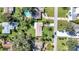 Aerial view of a neighborhood, highlighting a single Gathering home at 905 Valencia Rd, South Daytona, FL 32119