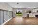 Bright dining area with hardwood floors and sliding glass doors at 905 Valencia Rd, South Daytona, FL 32119