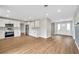 Modern kitchen with white cabinets, stainless steel appliances, and patterned backsplash at 905 Valencia Rd, South Daytona, FL 32119