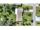 Aerial view of a single Gathering home with a large backyard at 905 Valencia Rd, South Daytona, FL 32119
