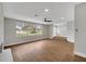 Spacious living area featuring hardwood floors and large windows at 905 Valencia Rd, South Daytona, FL 32119